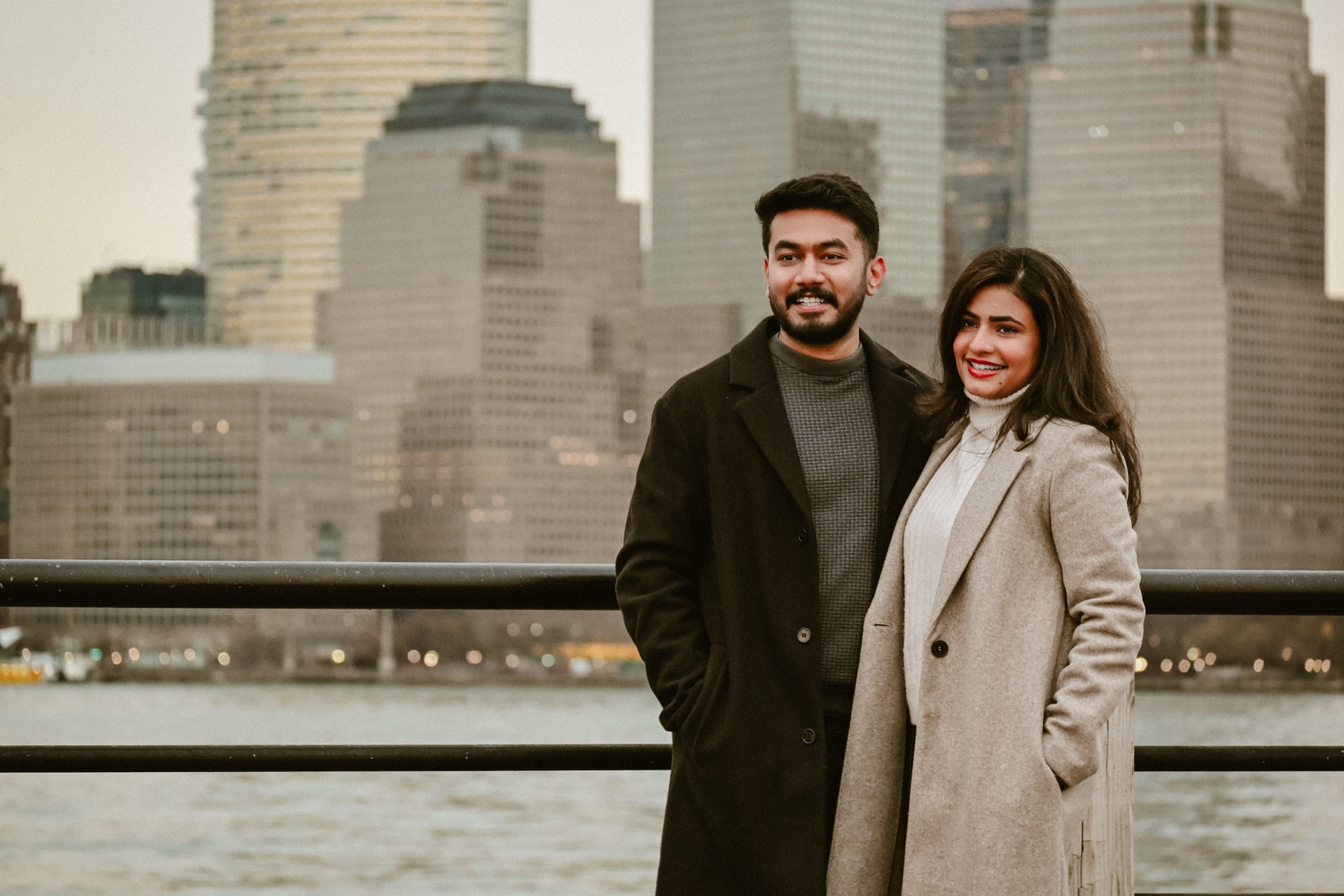 Jes and Athu in front of the Manhattan skyline
